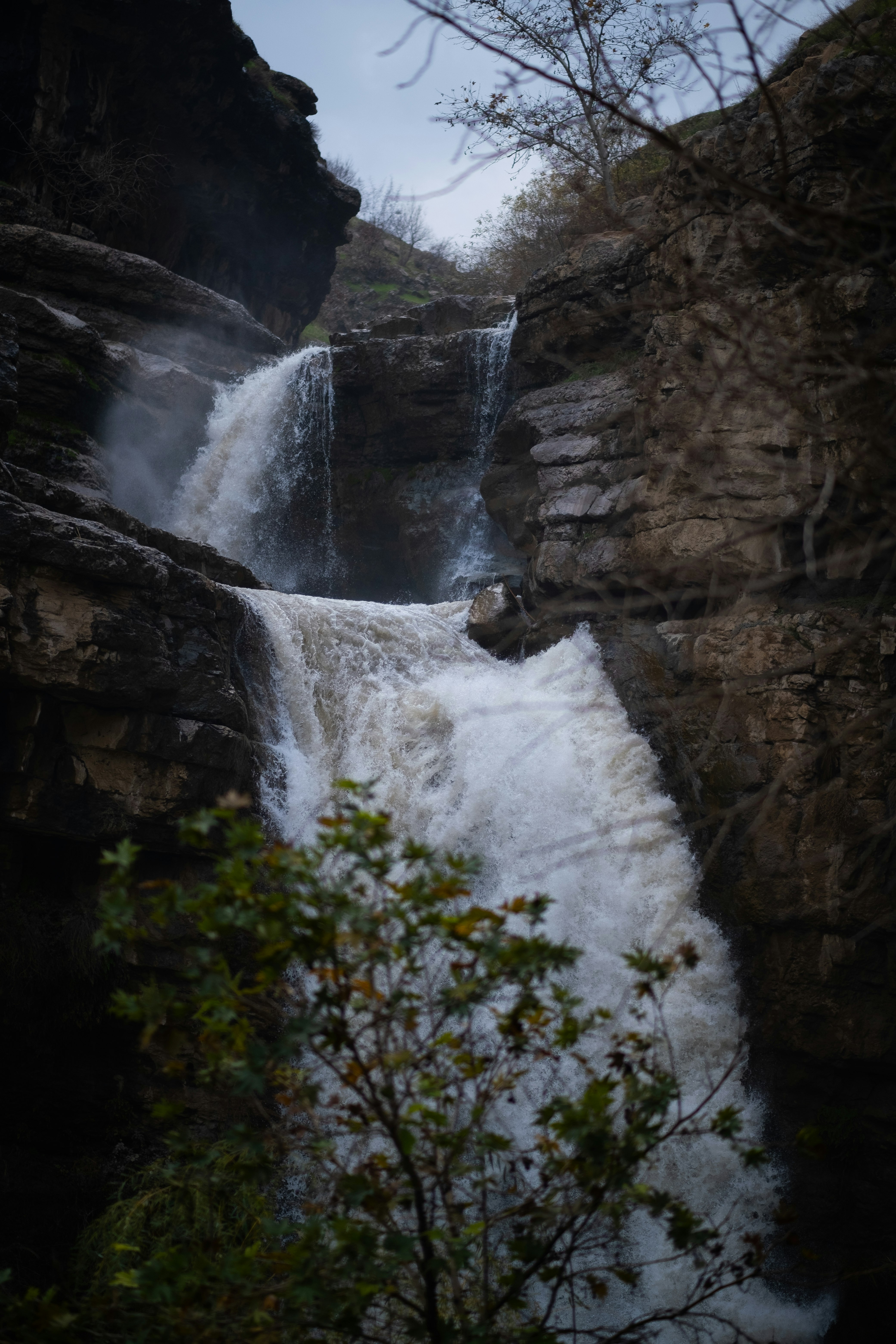 waterfalls in the middle of the forest